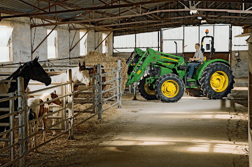 unnamed (32) john deere tractor in barn